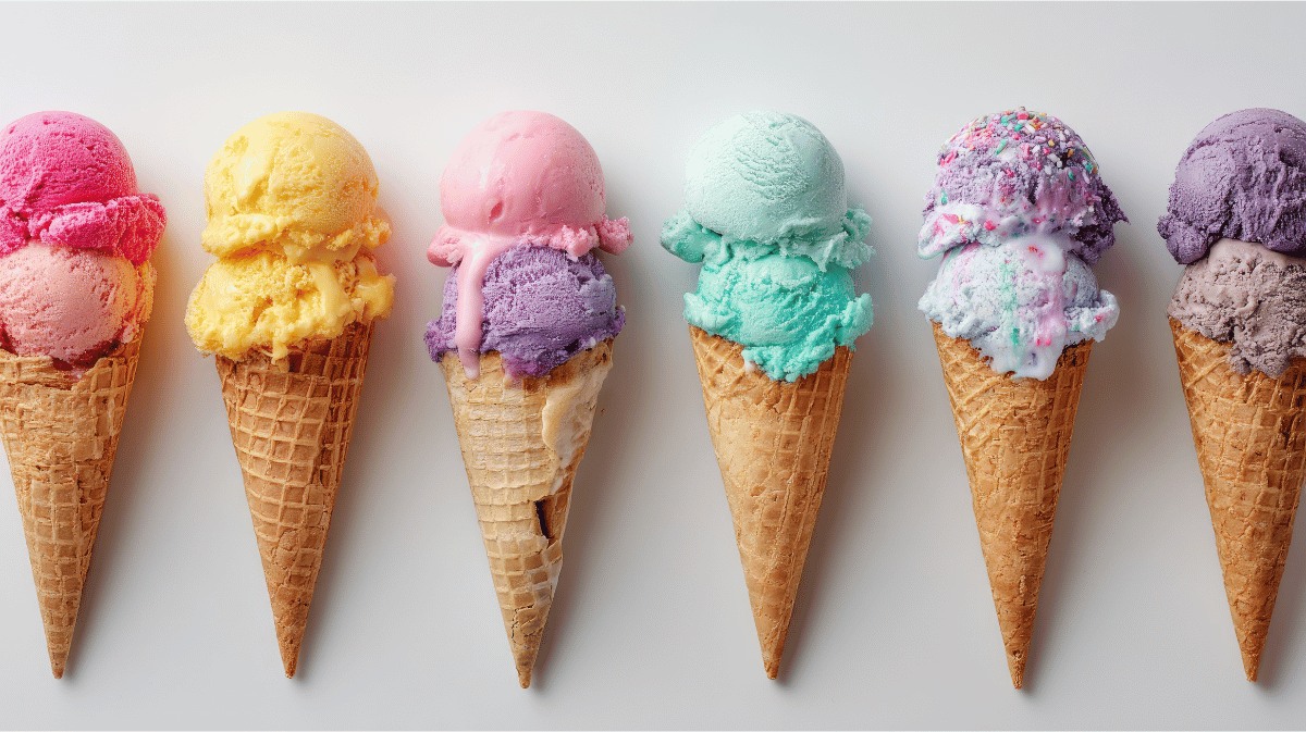 An array of different flavored ice cream cones
